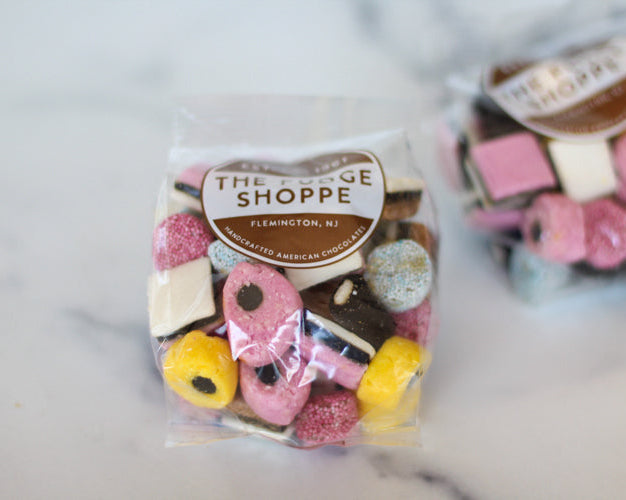 all sorts licorice on a marble surface
