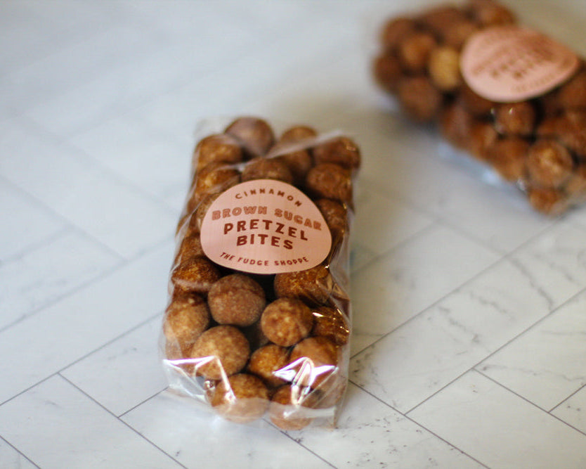 brown sugar pretzel bites on a white tile background