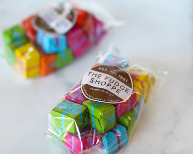 foiled presents on a white background
