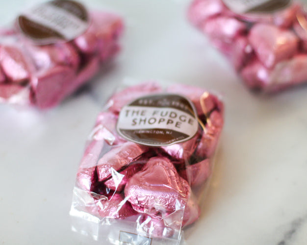 pink foiled hearts on a white background