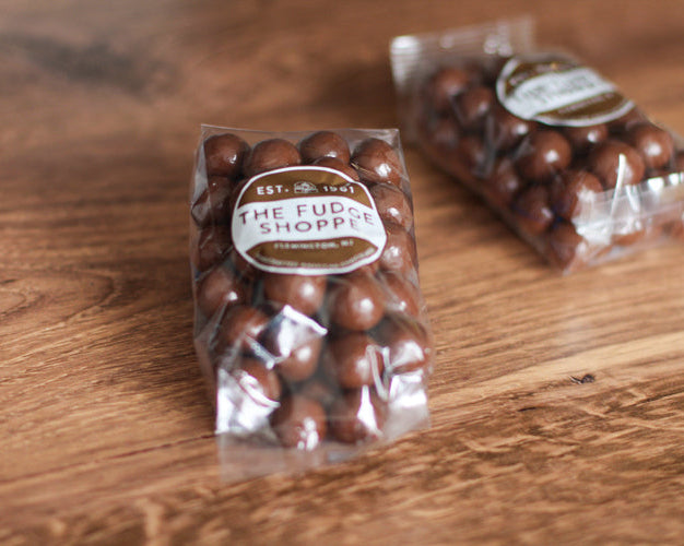 sugar free malt balls on a wooden surface