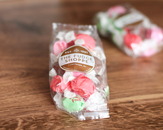 sugar free taffy in a clear bag on a wooden surface