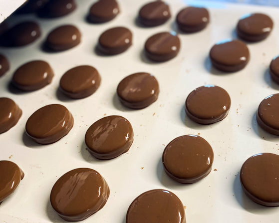 chocolate covered oreos going through enrober