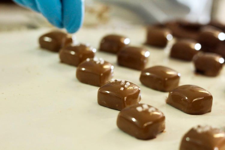 salted caramels on a enrober
