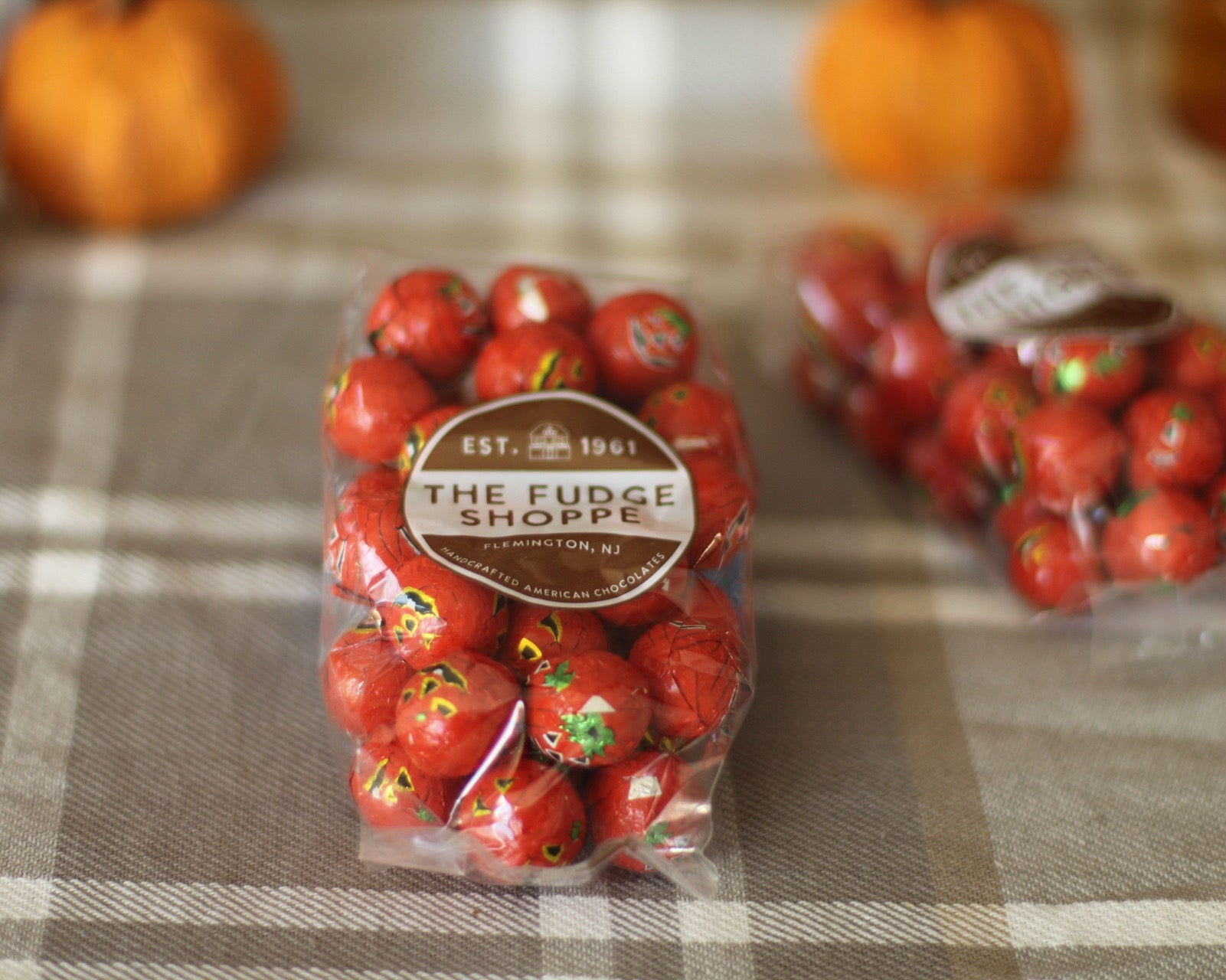 chocolate crispy halloween balls on a plaid background