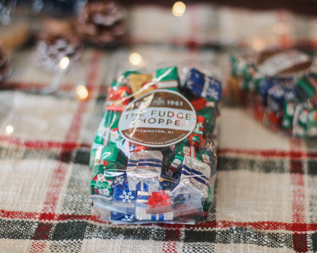 Foiled Milk Chocolate Presents on a plaid tablecloth