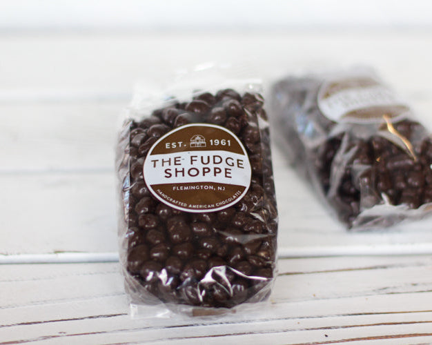 Packaged ginger chocolates on a white background