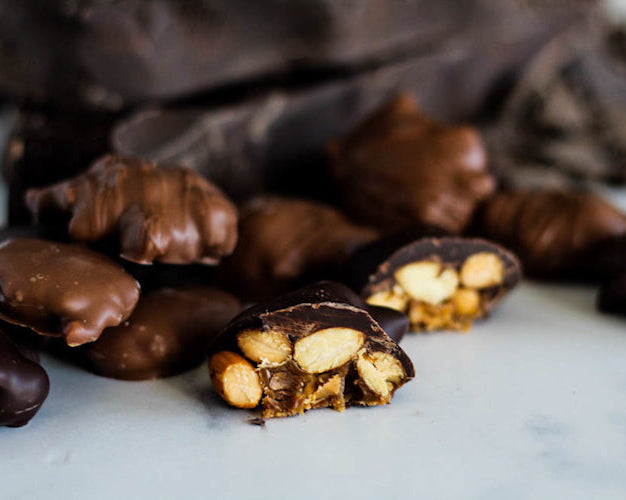 caramel nut patties on a white background